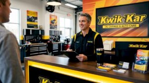 Mechanic at counter with ASE certifications