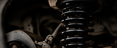 Fleet suspension repair service for commercial vehicles at Kwik Kar Spring Valley in Dallas, TX