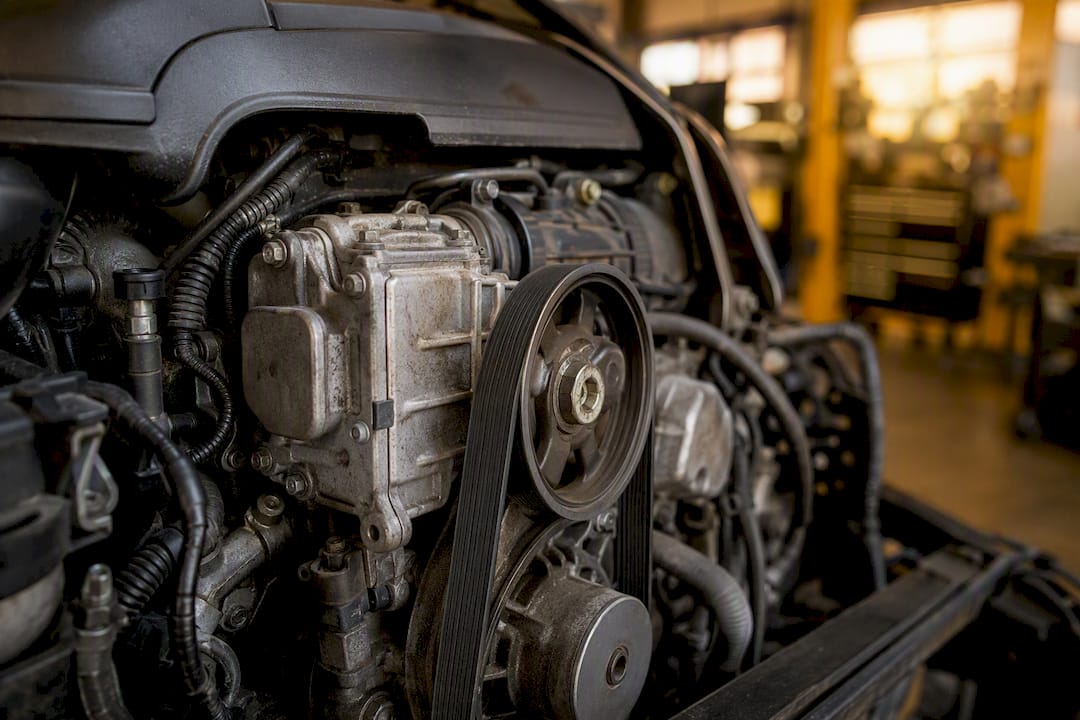 Close-up hybrid engine belt integrated starter generator