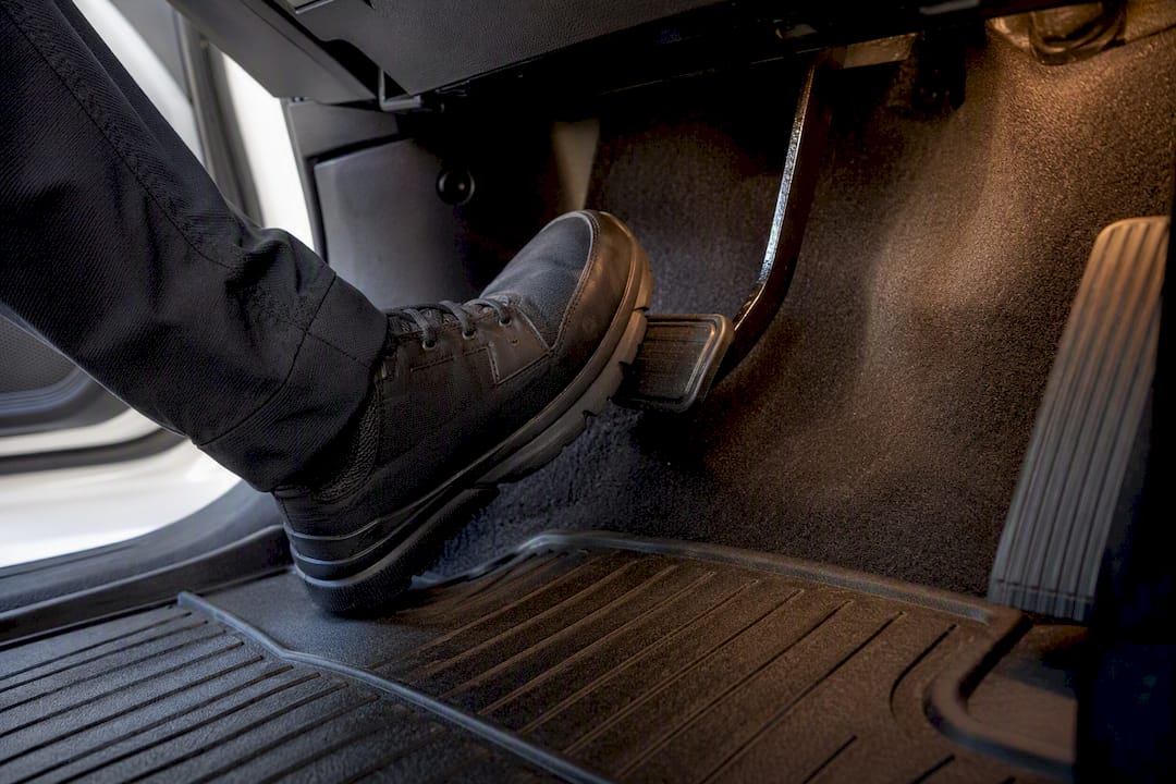 Brake pedal pressed toward floor